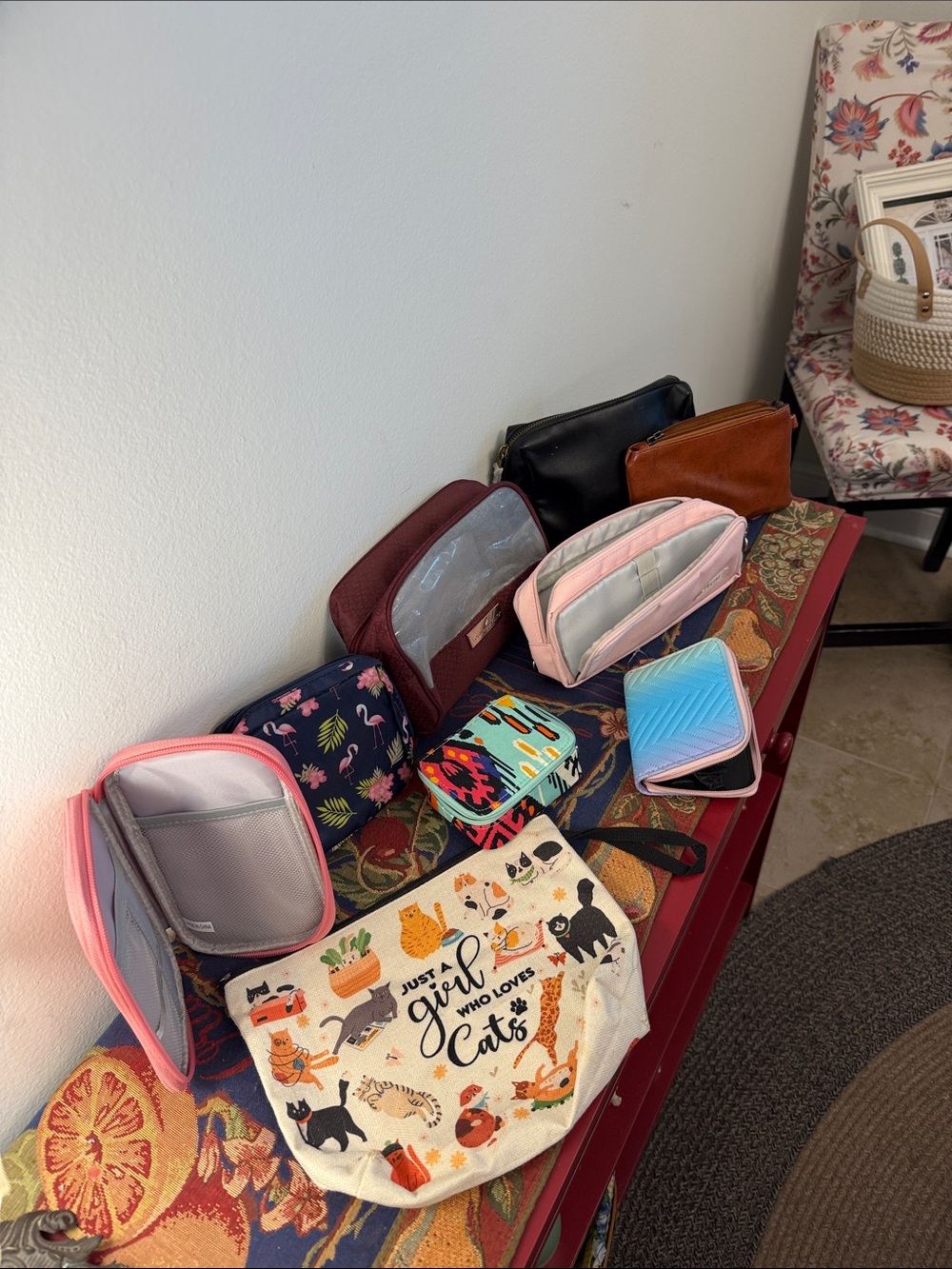 Assorted small bags for make up, phone cords and medication.